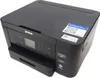 A black Epson Expression XP-5200 printer is shown from a slightly elevated front-left angle on a white background. Náhled obrázku produktu