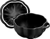 A black Staub cocotte with its lid placed next to it, on a white background. Produktbild-Vorschau