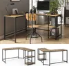 A home office setup with an L-shaped desk, chair, and computer. Anteprima dell’immagine prodotto