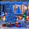 A festive outdoor Christmas decoration scene with a decorated tree, inflatable figures, and presents. Produktbild-Vorschau