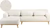 A white bouclé fabric sectional sofa with a chaise lounge on a white background. Podgląd zdjęcia produktu