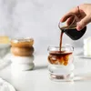 Coffee being poured into a glass. Náhľad obrázku produktu