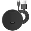 A black circular device with a USB cable attached, shown against a white background. Náhled obrázku produktu