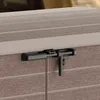 A close-up view of the latch mechanism on a storage box. Náhled obrázku produktu