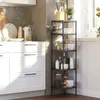 A kitchen scene with white cabinets and a black metal shelving unit filled with kitchen items. Náhled obrázku produktu