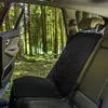 Inside of a car with the door open, parked in a forest setting. Produktbild-Vorschau