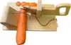 A wooden slicer with a carrot being sliced. Náhled obrázku produktu