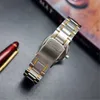 A close-up shot of a watch bracelet and clasp, with a pen in the background. Podgląd zdjęcia produktu