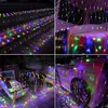 A collage of four images showing colorful LED net lights draped over outdoor furniture, stairs, and a wooden structure. Voir les images du produit