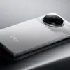 A close-up shot of the back of a silver smartphone, showing the camera module and the brand logo. Náhľad obrázku produktu