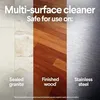 A collage of three different surfaces: sealed granite, finished wood, and stainless steel, with text overlay indicating they are safe for use with a multi-surface cleaner. Anteprima dell’immagine prodotto