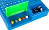 A close-up shot of a blue Mastermind game board with colorful pegs in a tray and a compartment filled with black and white pegs. Anteprima dell’immagine prodotto