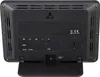 The back of a black weather station with various buttons and a battery compartment. Produktbild-Vorschau