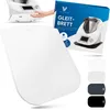 A white sliding board for a kitchen appliance is shown in the foreground, with a box and the appliance itself in the background. Produktbild-Vorschau
