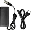 A black power adapter with a silver connector and a black power cord with a European plug. Produktbild-Vorschau