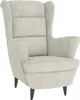 A cream-colored velvet armchair is shown against a white background. Náhľad obrázku produktu