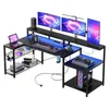 A gaming desk setup with multiple monitors, a computer, and accessories. Produktbild-Vorschau