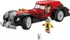 A LEGO model of Cruella de Vil's car with Cruella de Vil and a Dalmatian dog. Voir les images du produit