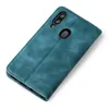 A teal-colored flip case for a smartphone, shown from a diagonal top-down view against a white background. Produktbild-Vorschau