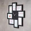 A black photo frame collage clock mounted on a textured gray wall. Produktbild-Vorschau