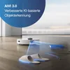 A white robot vacuum cleaner is shown on a wooden floor, with blue light projections indicating object detection around slippers and a charging dock. Voir les images du produit
