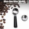 A coffee portafilter and filter basket are shown on a white background with coffee beans scattered around. Podgląd zdjęcia produktu