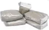 Several bags of sand filter media are stacked together on a white background. Produktbild-Vorschau