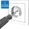 A screwdriver is being used to screw a child-proof socket cover into an electrical outlet. Náhľad obrázku produktu