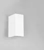 A white, modern outdoor wall light fixture is mounted on a light gray wall. Produktbild-Vorschau