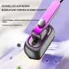 A product shot of a portable steam iron with text overlays and illustrative graphics. The iron is shown on a piece of fabric with steam emanating from it. Graphics of microbes are also present, suggesting a sanitizing function. Produktbild-Vorschau