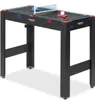 A multi-game table with a ping pong net and paddles set up. Produktbild-Vorschau