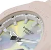 A close-up view of a pink G-Shock watch face with iridescent accents. Podgląd zdjęcia produktu