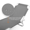 A close-up of a gray sun lounger with a magnified section showing water droplets on the fabric. Produktbild-Vorschau