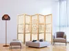A room with a folding screen, armchair, coffee table, and floor lamp. Anteprima dell’immagine prodotto