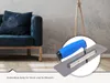 A trowel is shown in a circular overlay against a backdrop of a modern living room with a sofa and a textured wall. Produktbild-Vorschau