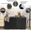 A black rattan storage box with cushions and a teddy bear on top, with feature callouts. Voir les images du produit