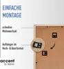 A close-up view of the back of a wooden picture frame, showing mounting hardware and descriptive text about its features. Produktbild-Vorschau