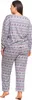 A woman is shown from the back wearing a grey pajama set with a Nordic-inspired pattern. Produktbild-Vorschau