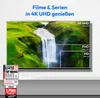 A television screen displaying a waterfall scene with resolution comparisons, alongside marketing awards and text. Produktbild-Vorschau