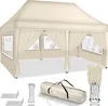 A beige pop-up canopy tent with side walls and windows, along with its accessories, is displayed on a white background. Náhľad obrázku produktu