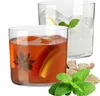 Two glasses of drinks with garnishes and ingredients. Náhľad obrázku produktu