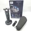 A Philips electric shaver, its charging stand, a power cord, and a travel case are displayed on a white background, with the product's packaging visible. Produktbild-Vorschau