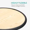 Close-up of a wooden surface with a black edge protector, with marketing text overlay. Produktbild-Vorschau