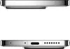 A close-up view of the bottom and top edges of a smartphone, showcasing its ports and metallic finish. Podgląd zdjęcia produktu