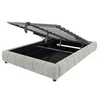 A bed frame with the mattress support lifted, revealing storage space underneath. Podgląd zdjęcia produktu