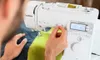 A person is using a white Brother sewing machine to sew a piece of green fabric. Náhľad obrázku produktu