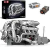 A detailed model of a V8 Biturbo engine, along with its packaging and electronic components, presented on a white background. Produktbild-Vorschau