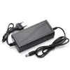 A black power adapter with two cables, one with a European plug and the other with a barrel connector, is shown on a white background. Produktbild-Vorschau