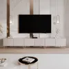 A modern living room setup featuring a TV stand and a large television. Náhled obrázku produktu