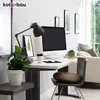 A modern home office setup with a desk, computer, lamp, and chair. Anteprima dell’immagine prodotto